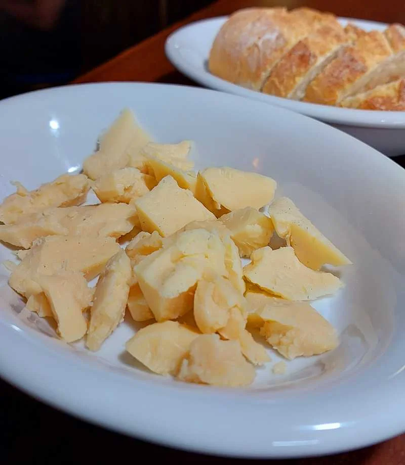 Porção de Queijo Parmesão